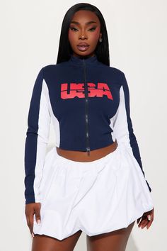 Available In Navy. High Neck Long Sleeve Front And Back Screen Front Zip-Up Contrast Trim Stretch Disclaimer: Due To The Printing Process A Difference In Saturation May Occur. Each Garment Is Unique. 94% Cotton 6% Elastane Imported | USA Victory Lap Top in Navy Blue size Small by Fashion Nova Navy Sports Hoodie Top, Sporty Navy Hooded Top, Nike Blue Collegiate Tops, Sporty Navy Pre-shrunk Tops, Navy Moisture-wicking Sportswear Top, High Neck Long Sleeve, Navy Fashion, Contrast Trim, Graphic Tees Women