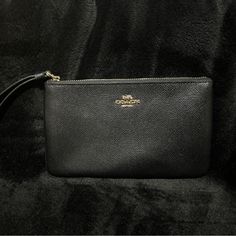 Coach Wristlet Like New, Tags Were Taken Off But Never Used Evening Rectangular Wristlet With Wrist Strap, Black Travel Wristlet With Wrist Strap, Black Pouch Wristlet With Wrist Strap, Black Wristlet With Wrist Strap For Travel, Elegant Black Wristlet For Gift, Elegant Black Clutch With Wrist Strap, Elegant Evening Wristlet, Classic Wristlet With Removable Pouch For Travel, Classic Travel Wristlet With Removable Pouch