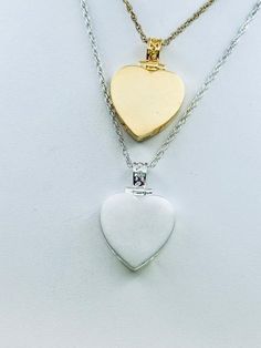 This beautiful heart pendant with satin finish is a unique way to hold a loved one's close with 2 compartments.  This pendant can hold a small amount of cremains, lock of hair, or dirt from the sacred burial grounds. This piece comes on an 18" matching chain, 3/4 inch size GOOD TO KNOW: ♥ Available in 14k plated gold or a Sterling Silver ♥THIS PENDANT CAN BE ENGRAVED-SEE PERSONALIZATION SECTION ♥Fill kit included with pendant PACKAGING: ♥The pendant comes in a small jewelry box that can easily be used for gifting ♥We can also ship directly to the recipient, just be sure to use their address in the shipping section at checkout SHIPPING: ♥SHIPPING ALWAYS FREE IN USA ♥INTERNATIONAL ORDERS SHIP PRIORITY INTERNATIONAL FOR FLAT RATE $30 Keepsake Double Heart Charm Necklace, Double Heart Locket Necklace For Wedding, Wedding Double Heart Locket Necklace, Double Heart Locket Necklace With Heart Charm For Wedding, White Gold Heart Necklace With Charm For Keepsake, Double Heart Locket Necklace For Anniversary, Keepsake Double Heart Necklace With Heart Charm, Double Heart Charm Locket Necklace For Wedding, White Gold Double Heart Keepsake Necklace