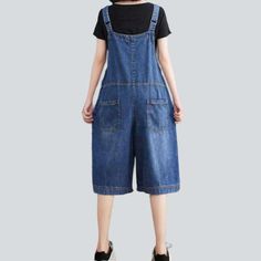 Introducing the 2023 Summer Collection ââ‚?denim romper with uneven buttons. 90s style! This established piece of punkish vogue is perfect for the trendsetter who loves to make a statement and stand out from the crowd.Why They're Your Next Summer StapleThese denim-inspired shorts are the perfect blend of contemporary vogue and nostalgic 90s underground. With a unique asymmetric button and zipper closure. they flaunt a damaged pattern that adds a hint of edginess to any look. Crafted with premium Spring Denim Shortalls With Bib Front, Denim Blue Bib Front Jumpsuit For Spring, Denim Blue Bib Front Jumpsuits And Rompers For Spring, Spring Bib Front Denim Jumpsuit, Relaxed Fit Denim Bib Front Jumpsuit For Spring, Casual Spring Jumpsuits And Rompers With Bib Front, Casual Overalls With Buttons, Blue Bib Front Denim Jumpsuit For Spring, Spring Cotton Shortalls In Medium Wash