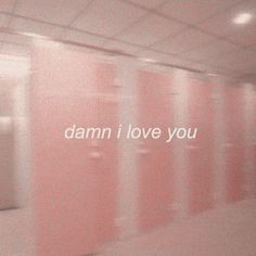 a blurry photo with the words damn i love you in white and pink colors