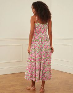 Block-printed by hand in the much-loved Lolita print, the Seychelles dress is a summer favorite you won’t want to take off. We love the pop of neon pink set against the zesty green in this vibrant print. Finished with adjustable spaghetti straps, a full, tiered skirt and rows of elastic under the bust, the Seychelles dress is an effortless and flattering piece you’ll wear again and again. Perfect for beach holidays, warmer days ahead and evenings out. Pink City Prints was founded to preserve the Beachwear Midi Dress For Summer Parties, Pink Vibrant Print Midi Dress For The Beach, Pink Midi Dress With Vibrant Print For Beach, Pink Floral Print Beachwear Midi Dress, Sleeveless Floral Midi Dress For Summer Parties, Vibrant Print Sundress For Summer Parties, Tropical Print Sundress For Summer Parties, Vibrant Sleeveless Floral Print Dress, Vibrant Sleeveless Dress For Summer Parties