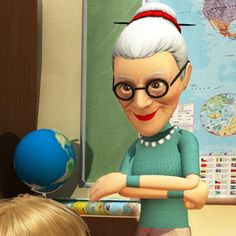 an older woman standing in front of a blackboard with a globe on the wall