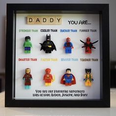 there are many legos on display in this shadow box that says, daddy you are