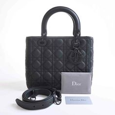 Christian Dior Lady Cannage Ultra Matte Leather Handbag BlackBrand: Christian DiorGender: WomenLine: Lady DiorColour: BlackMaterial: LeatherComes with: Shoulder strapSize (HxWxD): 20.5cm x 23.5cm x 12cm / 8.07'' x 9.25'' x 4.72''Condition: ExcellentCondition details: The item appears unused, with little to no signs of wear.Delivery 5-8 or 10-15 working days Please note that during high season and Sale period, delivery times may be affected We accept payment with a Credit card, Debit card, or PayPal. Handbag Black, Black Leather Handbags, Diaper Backpack, Casual Backpack, Lady Dior, Credit Card Debit, Black Handbags, Leather Handbag, Debit Card