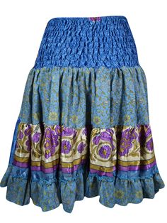 Womens Summer Ruched Skirt Blue Floral Beach Recycle Silk Skirts S/M The Skirt is the perfect addition to your wardrobe for those hot summer days. Made from recycled silk, this blue beach skirt features a ruched elastic waistband for a comfortable and flattering fit. Feel good about your style while helping the environment. Take on the summer with the Boho Style Summer Ruched Elastic Skirt! Made from recycled silk saree fabric in a bold Blue Floral hue, this skirt features a flattering short len Light Blue Lined Skirt For The Beach, Bohemian Silk Maxi Skirt For Spring, Spring Bohemian Silk Maxi Skirt, Light Blue Lined Skirt For Vacation, Blue Flared Maxi Skirt With Elastic Waistband, Silk Tiered Maxi Skirt For Summer, Summer Silk Tiered Maxi Skirt, Blue Ruffled Skirt Bottoms For Beach, Silk Gathered Skirt For Summer