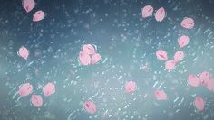 pink flowers floating in the air on a rainy day