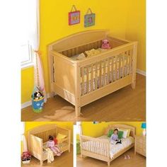 there is a baby crib in the room with yellow walls and pictures on the wall