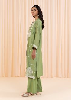 2 Piece - Embroidered Suit Make a bold statement with this 2-piece green dress, crafted from a combination of silk cotton net and viscose raw silk, with intricate embroidery for added texture and style. The full-sleeved jacket features a crew neckline, plain back, and embroidered border, while the trousers feature a boot cut design. Perfect for any occasion, this dress will be sure to turn heads. 2-Piece Front Open Jacket with TrousersMake a fashionable statement in green front open jacket featu Embroidered Green Cotton Silk Kurta, Green Embroidered Cotton Silk Kurta, Spring Designer Wear Cotton Silk Dress, Pista Green Straight Kurta For Spring, Spring Festive Chanderi Embroidered Dress, Spring Kurta With Floral Embroidery In Raw Silk, Spring Cotton Silk Kurta With Resham Embroidery, Spring Designer Cotton Silk Kurta, Spring Raw Silk Kurta With Floral Embroidery