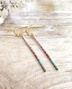 Matte olive, turquoise, rust, copper, light mauve, and pearl seed bead earrings. Choice of gold or silver finish. Lead/Nickel free hooks with rubber backs. 2 ¹/⁴ inches long. I'm slowly transitioning our smaller beaded earrings and adding new styles to our sister shop https://bohohobojewelryco.etsy.com  A few of our original beaded styles will stay here. Return to shop 👇 https://wyldsparrowjewelry.etsy.com PLEASE MAKE SURE YOUR ADDRESS IS ENTERED CORRECTLY. IF YOU ARE DOING A GUEST CHECKOUT PLE Bohemian 14k Gold-filled Beaded Earrings, Bohemian 14k Gold Filled Round Beaded Earrings, Bohemian Wire Wrapped Beaded Earrings For Everyday, Bohemian Beaded 14k Gold Filled Earrings, Bohemian 14k Gold Filled Beaded Dangle Earrings, Bohemian 14k Gold-filled Beaded Dangle Earrings, Bohemian 14k Gold Filled Earrings With Tiny Beads, Bohemian 14k Gold Filled Beaded Earrings, Boho Earrings Diy