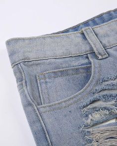 Details: Denim shorts with rip-off designBottom Length: ShortMaterials:75% Cotton + 25% Polyester