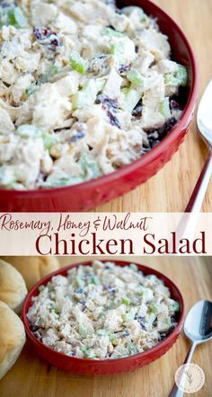 chicken salad in a red bowl on top of a wooden table next to bread rolls