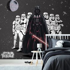 a star wars themed bedroom with black and white wallpaper