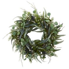 a green wreath with white flowers and greenery on the front is displayed against a white background