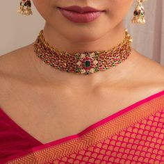 Description One of our favorites at Paksha! Contemporary aesthetics meet traditional elegance in this gold plated silver choker. Intricate floral motifs, studded with closely set semi-precious Kempu stones this versatile necklace sits perfectly pretty on the neck. Product Information Materials used : 925 Silver with 1.0-microns Gold Plating Stones: Semi precious stones Length: 20 cm and adjustable Findings: Hook and links Affordable Traditional Jewelry For Festive Occasions, Luxury Traditional Choker For Festive Occasions, Gold Plated Jewelry Indian, Simple Choker Necklace, Choker Sets, Mango Mala, Gold Jewelry Prom, Jaipur Jewelry, Beautiful Bangles