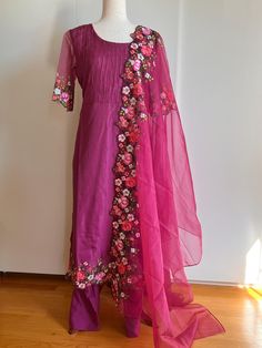 Pink Salwar Kameez with Organza Dupatta Bollywood Style Floor-length Kurta With Dori Work, Wedding Art Silk Kurta With Floral Embroidery, Festive Art Silk Kurta With Floral Embroidery, Floral Embroidered Dola Silk Churidar For Designer Wear, Traditional Churidar With Floral Embroidery In Dola Silk, Festive Kurta With Floral Embroidery For Diwali, Anarkali Churidar With Floral Embroidery For Transitional Season, Diwali Dola Silk Kurta With Floral Embroidery, Chanderi Kurta With Floral Embroidery For Wedding