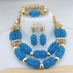 Enhance your bridal look with this classic Nigerian Wedding Bridal Jewelry. The African crystal beads jewelry set adds a touch of elegance and cultural significance to your wedding ensemble, creating a timeless and beautiful look. Traditional Beaded Bridal Set For Wedding, Polished Beads For Weddings, Traditional Gold Crystal Jewelry Sets, Elegant Jewelry With Beads For Traditional Ceremonies, Elegant Jewelry With Round Beads For Traditional Ceremonies, Traditional Beaded Jewelry For Marriage, Gold Beaded Necklace With Faceted Beads For Wedding, Crystal Jewelry With Gold Beads For Wedding, Gold Beads Crystal Jewelry