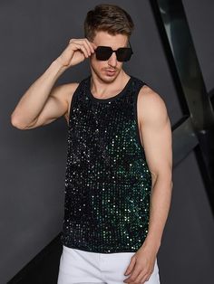 This men's black sequin tank top shirt is a stylish way to make a statement. Crafted with lightweight fabric and eye-catching sequins, it is perfect for dressing up any outfit. Durable stitching ensures a comfortable fit with no sagging. 100% Polyester Pull On closure Hand Wash or Dry Clean Quality polyester material, luxurious and lightweight fabric, soft and comfortable Brand Size Chest Waist S 43.7 40.6 M 45.7 42.5 L 48.7 45.5 XL 51.7 48.5 XXL 54.6 51.5 Sequin Tank Top, Winter Knit Hats, Sequin Tank, Sequin Tank Tops, White Sleeveless, Winter Knits, Black Sleeveless, Black Sequins, Sleeveless Tank Top