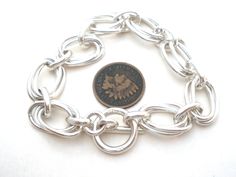 Mexican Jewelry - This is a sterling silver oval triple link bracelet. It is 7.5" long, .5" wide, hallmarked 925 ATI Mexico and weighs 30.8 grams. Mexican Jewelry, Link Bracelets, Charm Bracelet, Personalized Items, Bracelet, Sterling Silver, Silver, Mexico