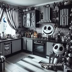 a kitchen decorated for halloween with black and white striped wallpaper, jack skellingy faces