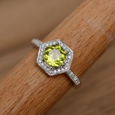 natural peridot ring gemstone ring wedding ring promise ring for her anniversary ring engagement rin Peridot Jewelry With Center Stone In Round Cut, Peridot Jewelry With Round Cut Center Stone, Peridot Jewelry With Center Stone, Round Cut Peridot Jewelry With Center Stone, Lime Green Peridot Jewelry With Center Stone, Peridot Birthstone Ring Round Cut, Peridot Birthstone Ring For May, Fine Jewelry Peridot Birthstone Ring In Round Cut, Peridot Birthstone Ring With Accent Stones