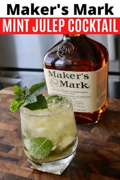 a bottle of maker's mark mint juice next to a glass filled with ice