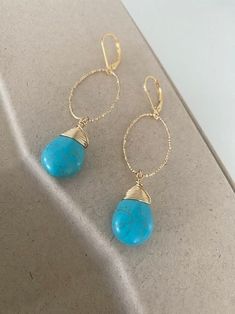 These large textured turquoise howlite hoop earrings are available in vermeil gold or sterling silver.  The earrings are finished with either 14k gold filled or sterling silver lever backs for a secure wear.  These beautiful lightweight earrings are perfect for any occasion and can easily worn dressed up or down, day to night.  A perfect handmade birthstone jewelry gift for a December birthday girl or a little treat for yourself! The earrings measure approx 2.5" from end to end and are approx 12 Turquoise 14k Gold Filled Drop Earrings, Turquoise 14k Gold-filled Earrings With Ear Wire, 14k Gold-filled Turquoise Jewelry With Ear Wire, Turquoise 14k Gold Filled Earrings, Elegant Turquoise 14k Gold Filled Earrings, Turquoise 14k Gold Filled Earrings For Gift, Turquoise 14k Gold Filled Earrings As Gift, Gift Turquoise 14k Gold Filled Earrings, Turquoise Hoop Jewelry Wire Wrapped