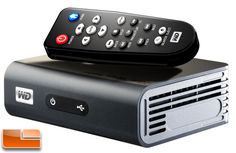 an image of a remote control on top of a tv box that is turned off