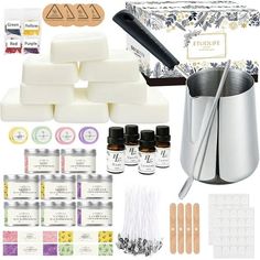 the contents of a kit including soaps, candles and other items