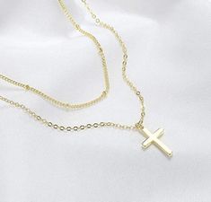 Super cute and dainty tiny cross charm on dainty chain 18k gold plated, Silver plated, 18k gold filled, or sterling silver. Gold vermeil sterling silver charm. Hypoallergenic nickel & lead free material -Silver plated cable chain -Silver plated satellite chain -18k Gold plated cable chain -18k Gold plated satellite chain -Sterling silver cable chain (read description below) -14k gold filled cable chain (read description below) Simple, Dainty, Delicate, yet so Elegant and Romantic. The shine Gold Adjustable Minimalist Cross Necklace, Gold Cross Necklace With Delicate Pendant, Gold Minimalist Tarnish Resistant Cross Necklace, Delicate Gold Cross Pendant Necklace, Dainty Gold Cross Pendant Necklace, Dainty Cross Necklace With Delicate Chain, Gold Double Strand Dainty Charm Necklace, Dainty Charm Necklace With Clavicle Chain And Cross Pendant, Dainty Cross Pendant Charm Necklace With Clavicle Chain