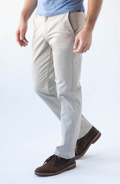 Cut with a modern straight fit, these performance pants are crafted from sanded sateen twill for flexibility, comfort and shape retention. They're enzyme washed for worn-in style, and the pocket liners are made with recycled REPREVE® yarns. 15" leg opening; 10 3/4" front rise 98% cotton, 2% spandex Machine wash, tumble dry Imported Beige Slim Fit Straight Leg Chinos, Beige Straight Leg Chino Pants, Beige Chino Cotton Twill Straight Pants, Beige Chino Cotton Twill Bottoms, Beige Chino Cotton Twill Pants With Straight Hem, Beige Chino Cotton Twill Pants For Business Casual, Beige Chino Cotton Twill Trousers, Business Casual Beige Chino Cotton Twill Pants, Beige Chino Cotton Twill Bottoms For Business Casual