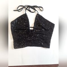 Sexy Black Sequin Halter! Black Fitted Crop Top For Party Season, Black Halter Crop Top For Festival, Black Stretch Crop Top For Party, Black Stretch Crop Top For Party Season, Glamorous Black Crop Top For Party Season, Black Halter Neck Top For Night Out, Black Halter Top For Night Out, Black Sequined Crop Top For Night Out, Trendy Black Sequined Crop Top