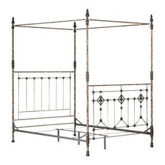 a metal bed frame with ornate designs on the headboard and foot board, against a white background