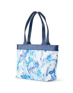 Rani Arabella's signature intricate prints and Italian craftsmanship comes to life in this bag. The small silhouette features a blue and white floral motif and is finished with navy blue leather handles for a luxurious finish. Wear it with a monochromatic outfit for a modern sophisticated look.