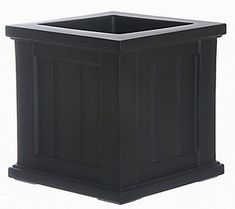 a black square planter on a white background