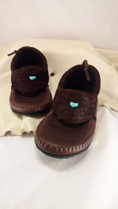 **TURNAROUND TIME IS CURRENTLY 2-4 MONTHS FOR ALL OF OUR MOCCASINS** If you need them more quickly, send us a message and we will let you know if we can make it work. The Clean Cut Round Cut Inca Moccasin is our slip on moccasin designed for minimalists or those seeking simplicity. If you're in a hurry and don't want to use your hands to put on your shoes, then give these guys two weeks to memorize your unique feet and, even with bunions or hammer toes, you will be able to slide these on easily! Womens Moccasin Boots, Making Moccasins, Moccasin Patterns, Sharpie Shoes, Handmade Moccasins, Moccasin Pattern, Baby Moccs, Hand Made Shoes, Beaded Moccasins