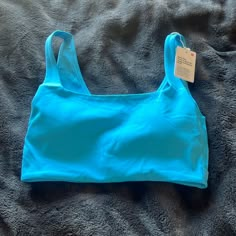 Bend This Scoop And Square Bra Lululemon Size Xxs/Xs Color Kybl Brand New With Tags 6 Blue Crop Top With Built-in Bra For Gym, Seamless Scoop Neck Sports Bra For Beach, Summer Scoop Neck Sports Bra, Summer Solid Color Scoop Neck Sports Bra, Sporty Scoop Neck Crop Top For Beach, Casual Blue Cropped Sports Bra, Casual Cropped Blue Sports Bra, Blue Bra Friendly Crop Top For Yoga, Beach Scoop Neck Top With Seamless Construction