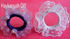 two different types of hair accessories sitting on a pink surface with the words hakkanush diy written above them