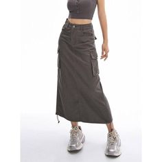 Introducing Our Latest Arrival Elevate your summer wardrobe with our New Cargo Long Skirt – a perfect blend of comfort, style, and versatility. This casual drawstring skirt with pockets is designed for the modern woman who values both fashion and functionality. Key Features Empire Waistline for a flattering fit Mid-Calf Length – the ideal balance of modesty and trendiness No-Nonsense Decoration – embrace simplicity with a clean look A-Line Silhouette for a graceful and timeless appeal Solid Pattern Type – a wardrobe staple that pairs effortlessly Crafted from a blend of Cotton and Polyester for ultimate comfort Non-Stretch Elasticity for a structured and reliable fit Regular Fit – providing comfort without compromising style When to Wear This high-waisted skirt is your go-to choice for cas Trendy Drawstring Skirt For Spring, Casual Cargo Skirt For Spring, Trendy Spring Cargo Skirt, Casual Cotton Skirt With Drawstring, Summer Cotton Skirt With Cargo Pockets, Cotton Summer Skirt With Cargo Pockets, Casual Summer Skirt With Drawstring, Trendy Relaxed Fit Solid Color Skirt, Trendy Spring Cargo Skirt With Lining