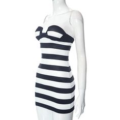 This dress features a strapless design and chest wrap detailing, creating a flattering and modern silhouette. The striped pattern adds a touch of sophistication to the look. - Color: Black- Style: Bodycon- Pattern Type: Stripe- Sleeve Length: Strapless- Length: Mini - Fabric: Polyester- Fit Type: Slim Fit- Occasion: Casual, Party- Gender: Women- Size: S, M, L Striped Sleeve, Casual Party, Black Style, Blazer Coat, Striped Dress, Coat Dress, Pre Order, Jacket Dress, Jumpsuit Dress