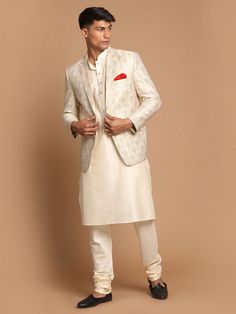 Vastramay Men's Gold Woven Blazer And Cream Solid Kurta With Pajama Set Classic Bandhgala For Eid Festivities, Classic Bandhgala For Eid Festival, Classic Eid Festive Sets, Classic Festive Sets For Eid, Gold Nehru Jacket With Gold Embroidery For Diwali, Semi-formal Nehru Jacket With Zari Work For Festive Occasions, Festive Gold Sets For Groom, Gold Festive Unstitched Suit For Formal Occasions, Gold Festive Formal Unstitched Suit