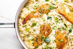 chicken and rice casserole with parsley in a pan