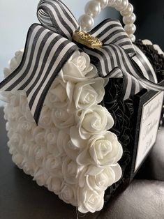 a black and white box with flowers on it