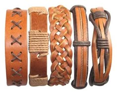 four different types of leather bracelets with braiding on the ends and one has a knot at the end