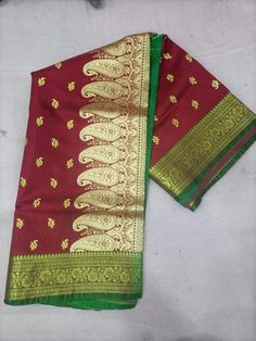 Hand Woven Banarsi Satin Silk Heavy Zari Pallu Bridal Silk Saree With Blouse OFFER- EXTRA 20$ OFF ON PURCHASE OF TWO PRODUCTS. A beautiful, delightful, and absolutely luxurious Banarasi dream! For Instance, The Saree Has where each thread of the Butiy Is knitted by hands. Additionally, It comes In the purest banarasi silk with the pure banarasi silk blouse piece. above all, with vows to sustainable fashion, this silk handloom product from Banaras is a masterpiece involving of brilliance & sheer endeavor of our creative artisans. Tassels vary from the image. Blouse worn by model is for styling purpose only. FABRIC - Banarasi Satin Silk BLOUSE PIECE - Yes TECHNIQUE - This Splendid Masterpiece is made of the finest Fekwa technique of Banaras. WEAVE - Handwoven SILK - 100% Authentic Banarasi S Ceremonial Navratri Blouse Piece With Self Design, Ceremonial Blouse Piece For Navratri, Ceremonial Self Design Blouse Piece For Navratri, Traditional Art Silk Blouse Piece For Ceremonial, Traditional Art Silk Ceremonial Blouse Piece, Ceremonial Art Silk Traditional Wear With Cutdana, Ceremonial Saree Blouse Piece For Festivals, Ceremonial Saree Blouse For Festivals, Ceremonial Jamawar Saree With Self Design