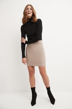 You know that some things never go out of fashion. Whether it’s representing your company at that big event or attending your friend’s birthday party, you can trust this classic, above-the-knee pencil skirt. Its soft waistband offers the perfect support for a slim silhouette, making you comfortable for long hours. As you take prospects through a demo or greet old friends for a brunch, this versatile skirt pairs easily with any sophisticated tops of yours. Made with a blend of rayon, nylon, and s Fitted Solid Mini Skirt For Fall, Sleek Mini Pencil Skirt For Party, Trendy Fall Pencil Mini Skirt, Chic Short Length Pencil Skirt For Night Out, Sleek Pencil Skirt For Fall, Fall Sleek Mini Skirt, Fall Mini Skirt In Sleek Style, Classic Pencil Skirt For Party, Fall Pencil Skirt For Night Out