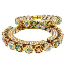 Discover the elegance of our Jadau bangles featuring Kundan and traditional designs. These charm bangles are meticulously crafted with high-quality materials and showcase the intricate artistry of Pachi Kundan jewelry. Perfect for special occasions, these openable Kada bangles blend traditional charm with contemporary style, making them a versatile addition to any jewelry collection. Whether you're dressing up for a wedding, festival, or a special event, these Jadau bangles with Kundan are designed to make you stand out. The openable feature adds convenience while maintaining the beauty and sophistication of the design. Traditional Heavy Bangle For Navratri, Traditional Festive Ceremonial Bangle, Heavy Bangle For Navratri, Kundan Multicolor Bangle, Multicolor Bracelets For Navratri Celebration, Traditional Bangle For Navratri With Intricate Design, Multicolor Cutdana Bracelets For Navratri, Adjustable Temple Jewelry Bangle For Celebrations, Multicolor Stone Work Bracelets For Festive Occasions