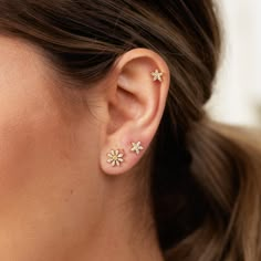 Simple sparkle at its best, these sparkling flower stud earrings are a Scream Pretty favourite. Perfect for a bridal party, gifting to bridesmaids to wear or perfect for a second or third piercing. The flower motif would work just as well for a summer barbeque with a floaty dress - these dainty sparkling flower studs are for everyone and everything!All Scream Pretty pieces will be beautifully presented in our signature branded packaging. Material: 18ct Gold Plated Recycled Sterling Silver with C Third Piercing, Second Ear Piercing, Hannah Martin, Daytime Dress, Summer Barbeque, Ear Piercing Studs, Matching Jewellery, Floaty Dress, Bridal Jewelry Collection