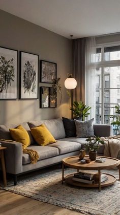 a living room filled with furniture and lots of windows