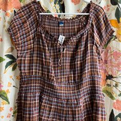 Super Cute And Comfy! Brown Plaid Peplum Shirt From Old Navy. Size Xxl. A Little Big For Me So I Never Got To Wear It. Casual Tops With Elastic Waistband For Daywear, Casual Smocked Top With Short Sleeves And Elastic Waistband, Casual Smocked Top With Elastic Waistband, Casual Smocked Short Sleeve Top For Day Out, Casual Short Sleeve Smocked Top For Day Out, Casual Summer Peasant Top With Ruffle Hem, Casual Short Sleeve Peasant Top For Beach, Casual Smocked Top With Ruffles, Casual Smocked Short Sleeve Top For Beach